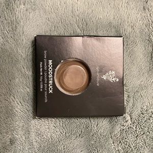 Dark brown brow powder